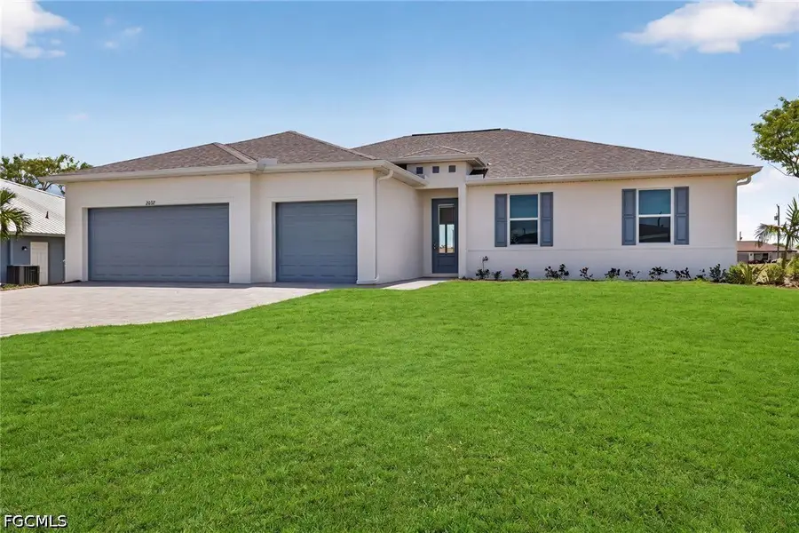 Front exterior of a new home in Cape Coral, Cape Coral, FL, highlighting curb appeal (Image 2). Front exterior of a new home in Cape Coral, Cape Coral, FL, highlighting curb appeal (Image 2).