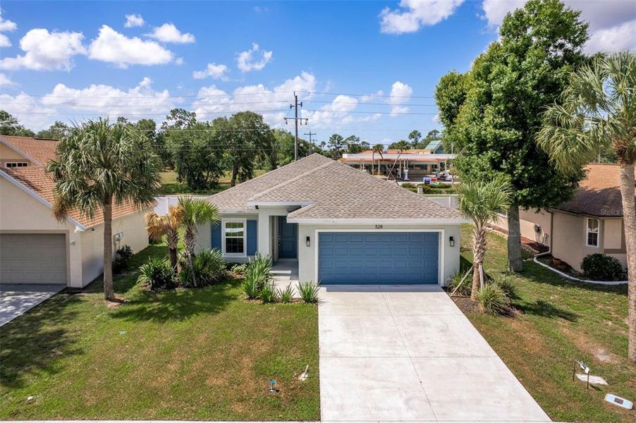 Front exterior of a new home in , Port Charlotte, FL, highlighting curb appeal (Image 27).