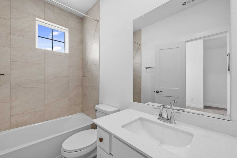 Furnished interior view inside a new home in Bridgeland, Cypress (Image 9). Furnished interior view inside a new home in Bridgeland, Cypress (Image 9).