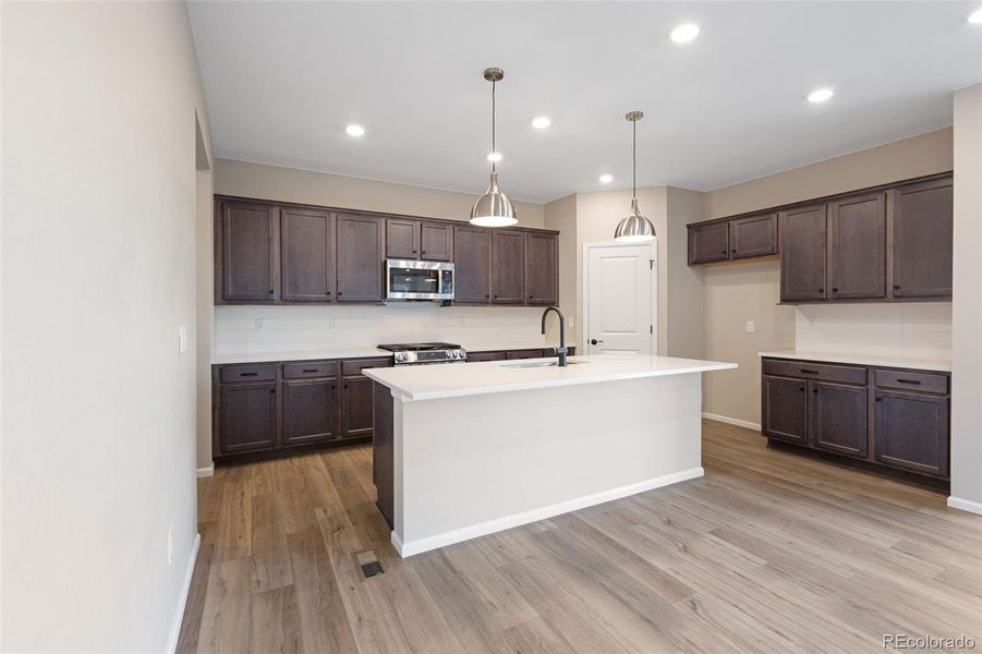 Furnished interior view inside a new home in The Cottages Collection at Ridgeline Vista, Brighton (Image 5).