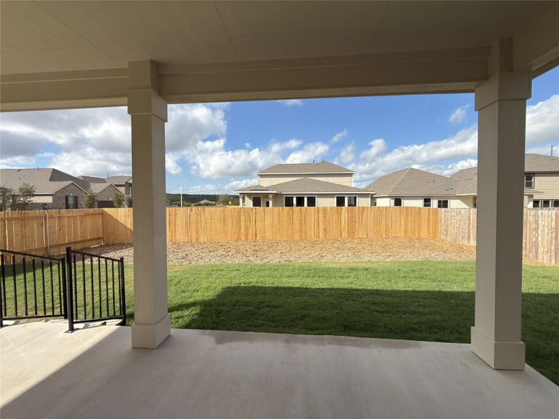 Exterior details and patio area of a home in River Bluff, Leander (Image 25).
