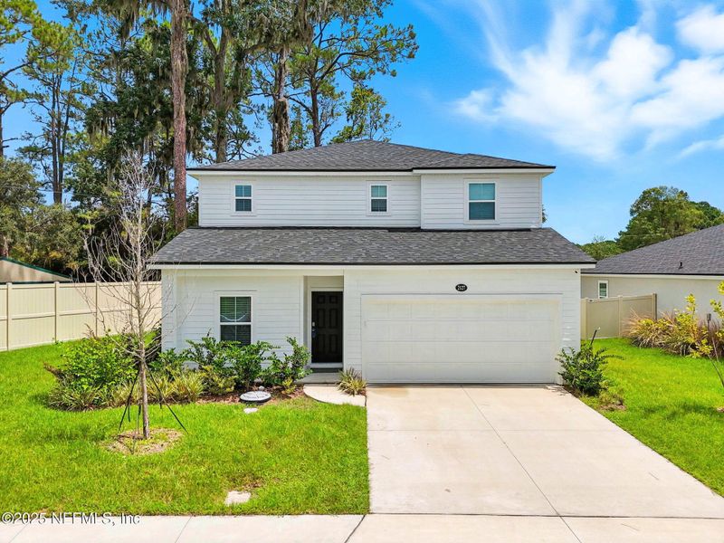 Front exterior of a new home in , Jacksonville, FL, highlighting curb appeal (Image 28).