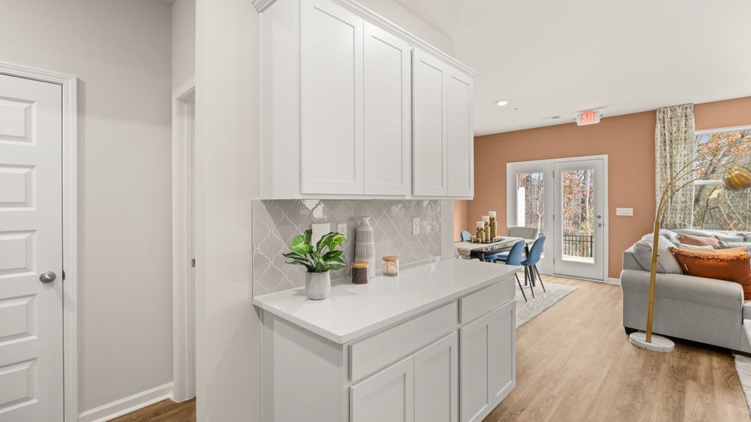 Representative furnished interior of a home built from the Stratford by D.R. Horton in Echo Glen, Stockbridge (Image 8).