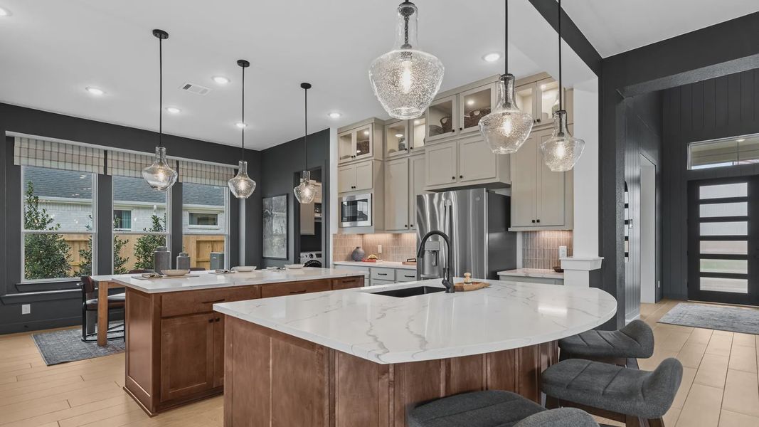 Representative furnished interior of a home built from the Acadia by Chesmar Homes in Elyson 50's, Katy (Image 10).