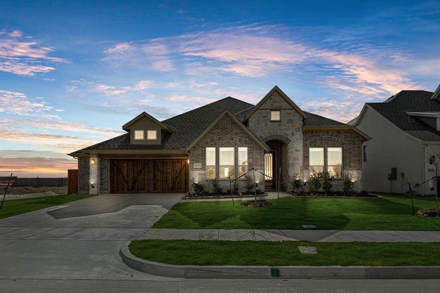 Front exterior of a new home in Villages of Walnut Grove, Midlothian, TX, highlighting curb appeal (Image 2).