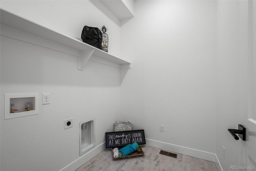 Spacious, unfurnished interior of a new home in Revel Crossing at Wolf Ranch - The Panorama Collection, Colorado Springs (Image 24).