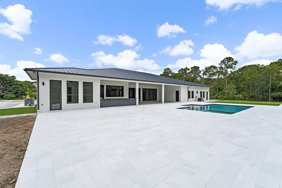 Front exterior of a new home in , Jupiter, FL, highlighting curb appeal (Image 30).