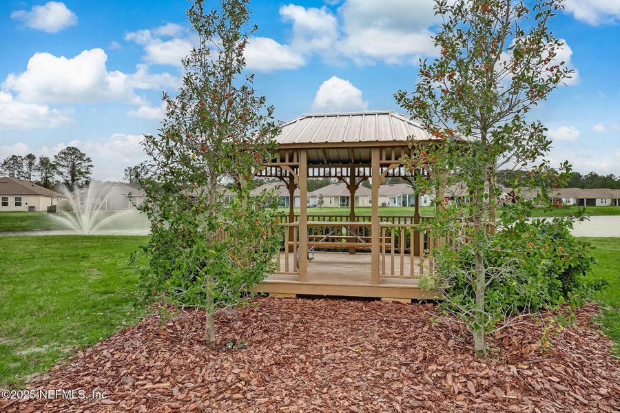 Front exterior of a new home in Dorado at Entrada, St. Augustine, FL, highlighting curb appeal (Image 28).