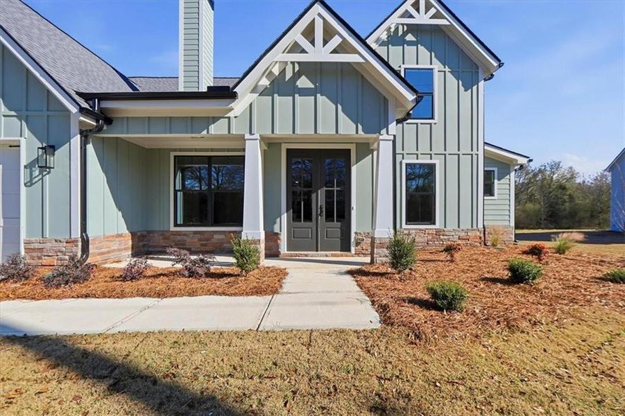 Front exterior of a new home in , Statham, GA, highlighting curb appeal (Image 31).