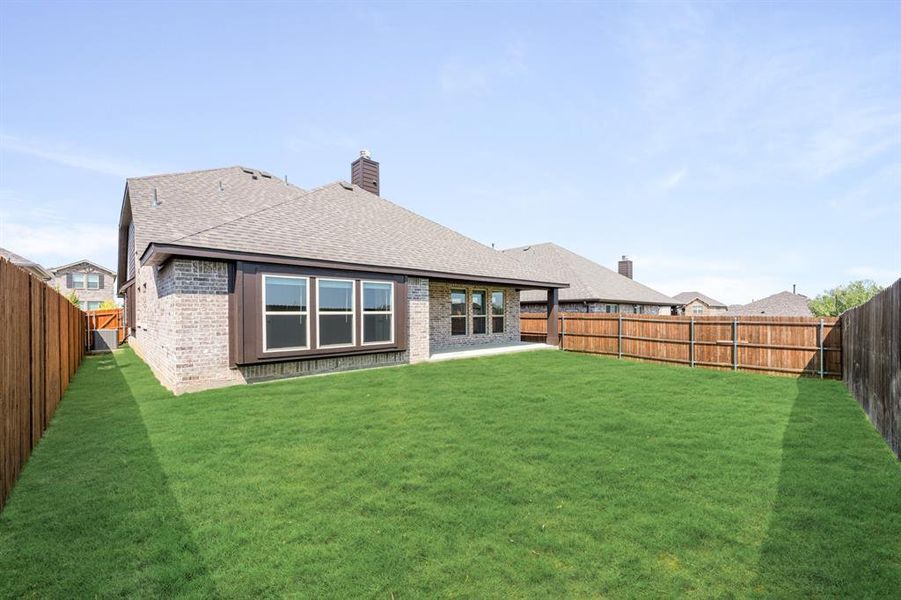 Exterior details and patio area of a home in Godley Ranch Classic, Godley (Image 25). Exterior details and patio area of a home in Godley Ranch Classic, Godley (Image 25).
