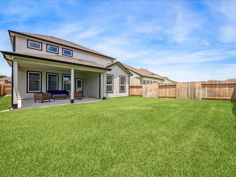 Front exterior of a new home in Champions Oak, Houston, TX, highlighting curb appeal (Image 16).