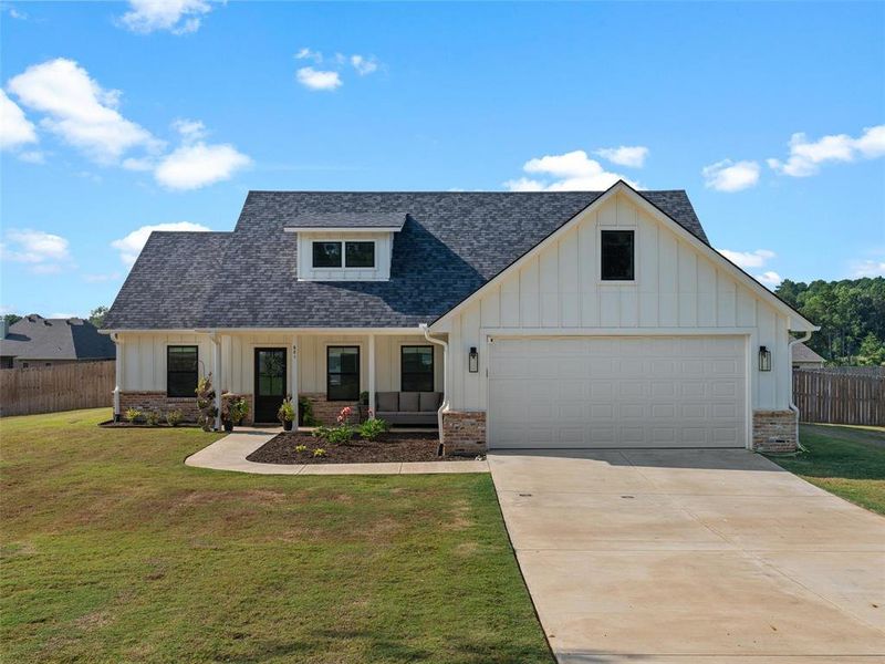 Front exterior of a new home in , Kilgore, TX, highlighting curb appeal (Image 2). Front exterior of a new home in , Kilgore, TX, highlighting curb appeal (Image 2).