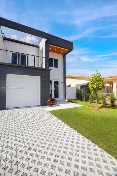 Front exterior of a new home in , Miami, FL, highlighting curb appeal (Image 21).