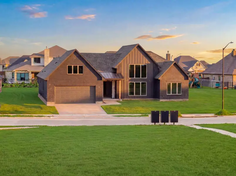 Front exterior of a new home in , College Station, TX, highlighting curb appeal (Image 9).