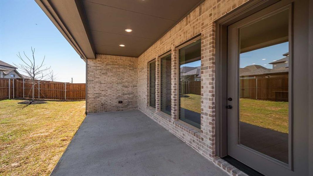 Exterior details and patio area of a home in Cambridge Crossing, Celina (Image 3).