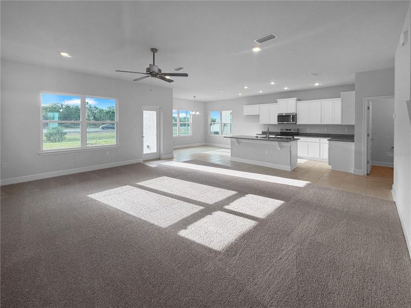 Spacious, unfurnished interior of a new home in Harmony Central, St. Cloud (Image 9).