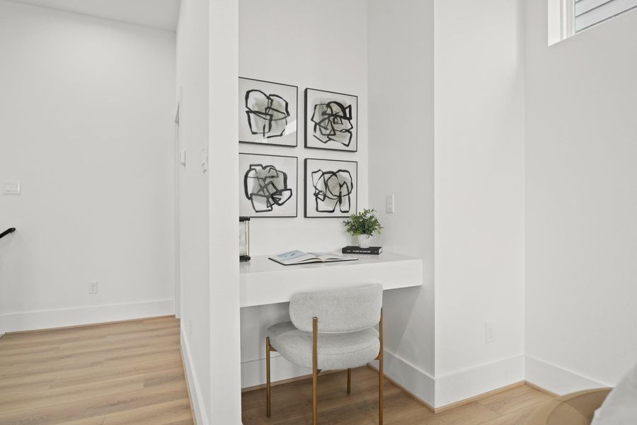 To the left of the family area is a study nook which is aperfect set up for a private desk area or a bar area.