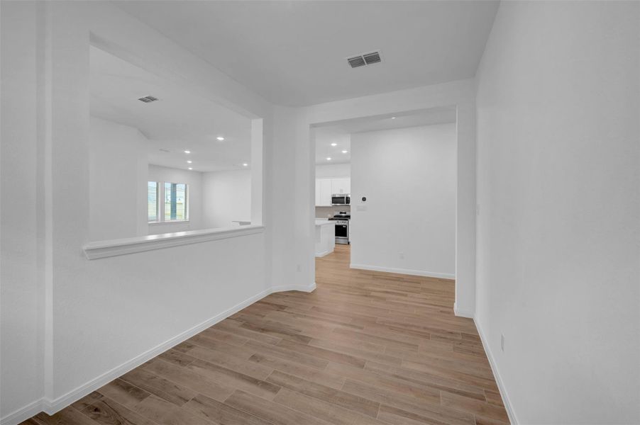 Spacious, unfurnished interior of a new home in Meridiana - Terrace Collection, Manvel (Image 13).