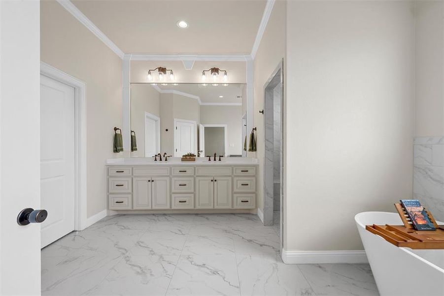 Spacious primary bathroom with dual-sink vanity, granite countertops, and garden tub. Spacious primary bathroom with dual-sink vanity, granite countertops, and garden tub.