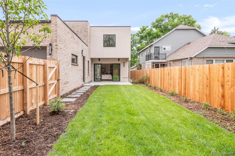Front exterior of a new home in , Denver, CO, highlighting curb appeal (Image 22).