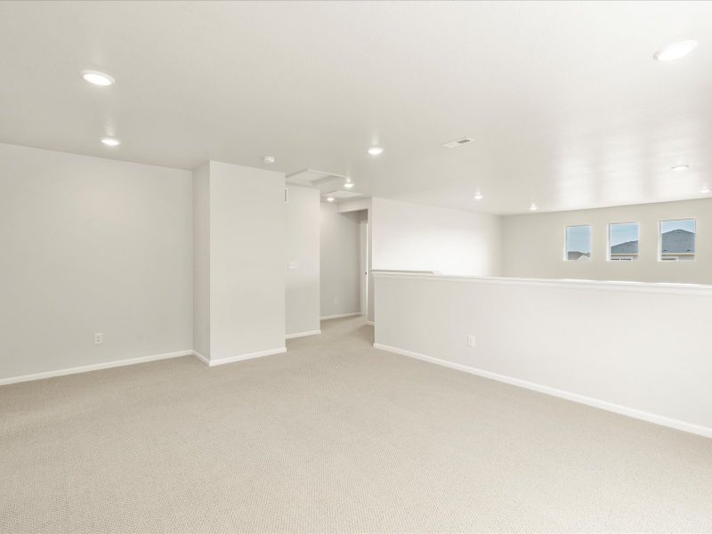 Spacious, unfurnished interior of a new home in Buffalo Highlands: The Flora Collection, Commerce City (Image 12).