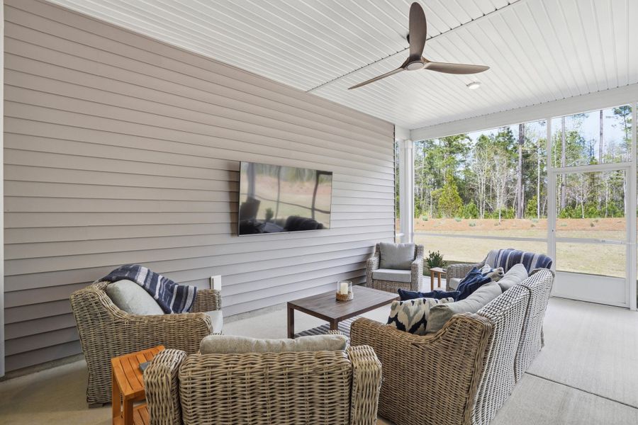 Exterior details and patio area of a home in Summerwind Crossing at Lakes of Cane Bay, Summerville (Image 4).