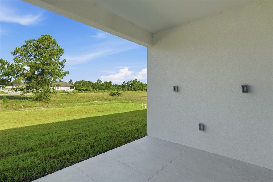 Exterior details and patio area of a home in , Lehigh Acres (Image 3). Exterior details and patio area of a home in , Lehigh Acres (Image 3).