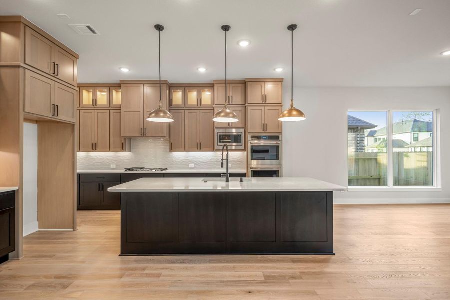 Furnished interior view inside a new home in ARTAVIA 70′ Lots, Conroe (Image 14).