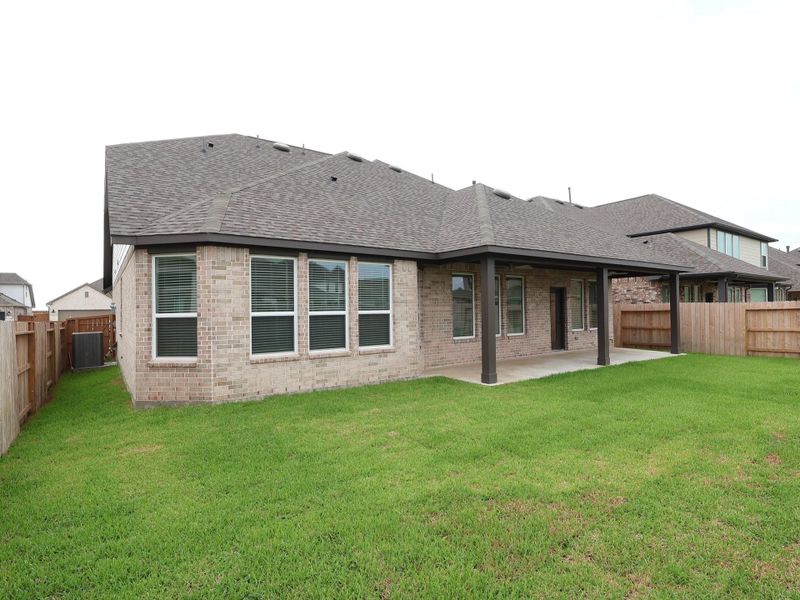 Front exterior of a new home in Marvida, Cypress, TX, highlighting curb appeal (Image 16).