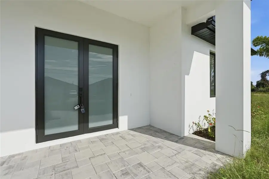 Exterior details and patio area of a home in , Port Charlotte (Image 2). Exterior details and patio area of a home in , Port Charlotte (Image 2).