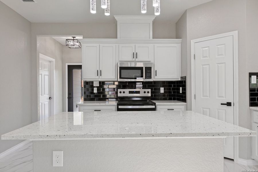 Furnished interior view inside a new home in , Poteet (Image 12).