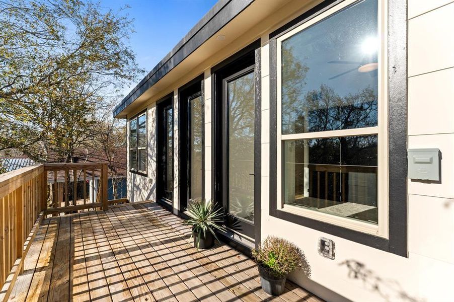 Both the front and rear balconies provide tranquil outdoor spaces with serene views.