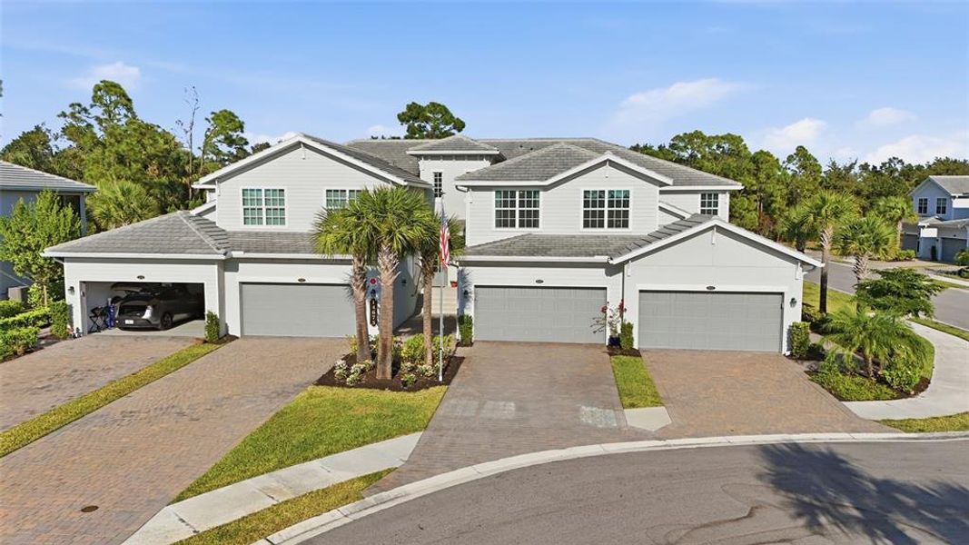 Front exterior of a new home in , Punta Gorda, FL, highlighting curb appeal (Image 2).