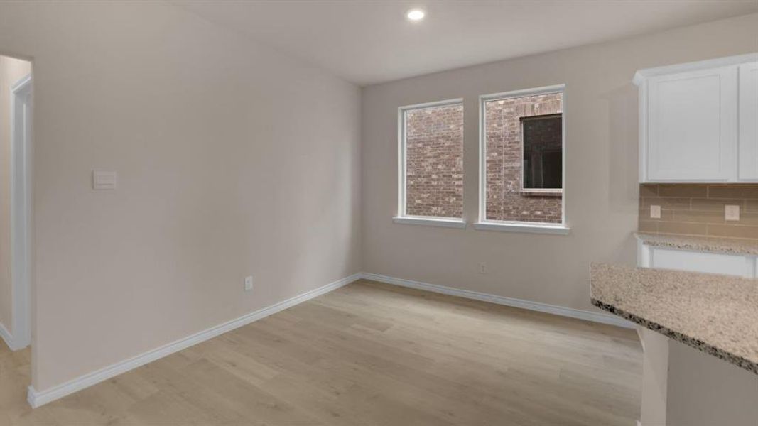 Spacious, unfurnished interior of a new home in The Landing at Hidden Lakes, McKinney (Image 8).