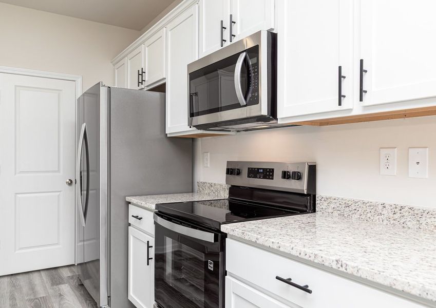Each kitchen includes stainless-steel appliances