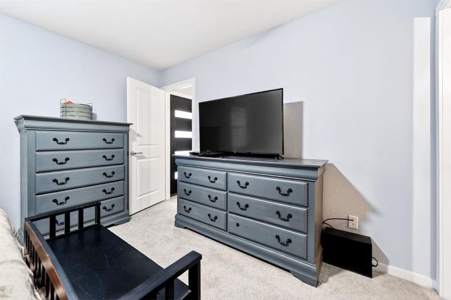 Light-colored walls featuring a white trim