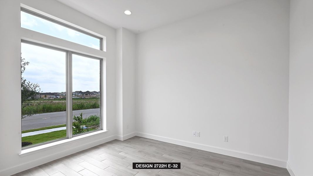 Unfurnished room with light wood-style flooring and recessed lighting
