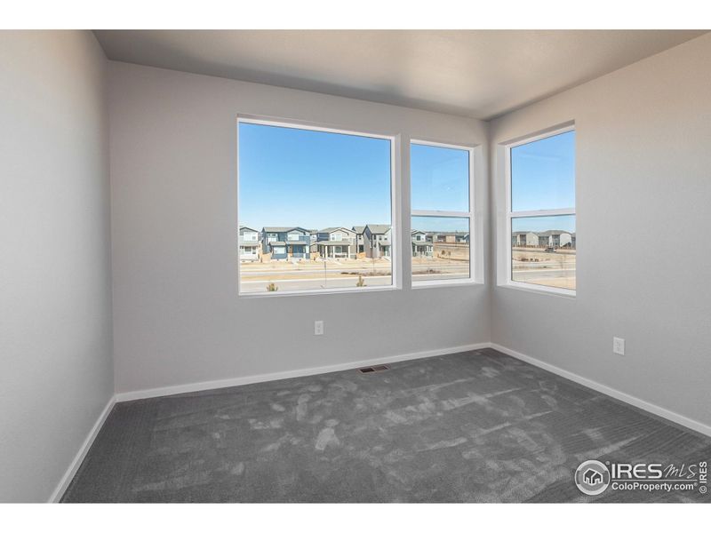 Spacious, unfurnished interior of a new home in Trailside Alley Load - Single Family Homes, Timnath (Image 33).