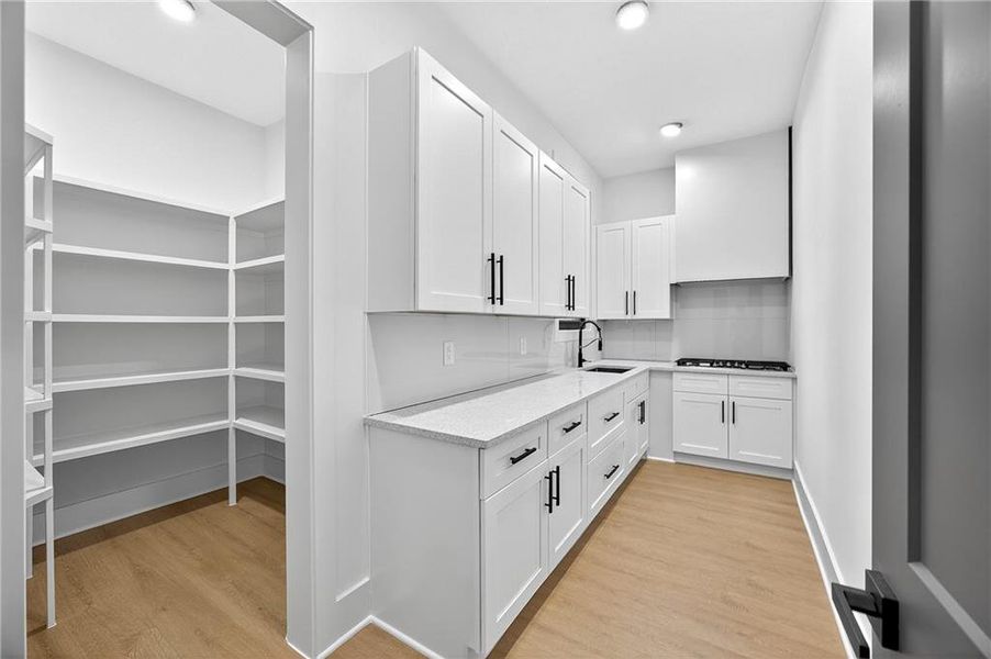 Furnished interior view inside a new home in , Auburn (Image 8).