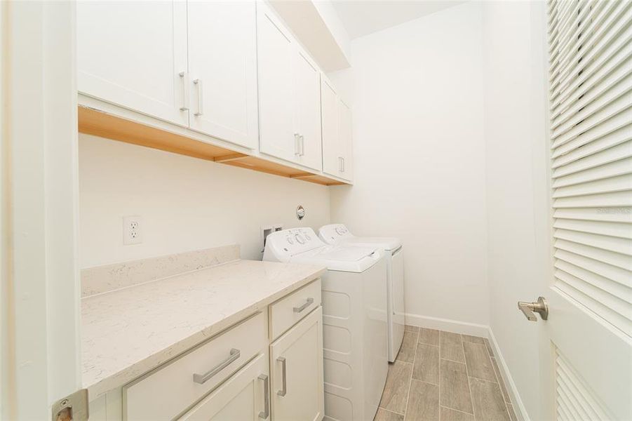 Furnished interior view inside a new home in Tesoro Club, Port St. Lucie (Image 12).