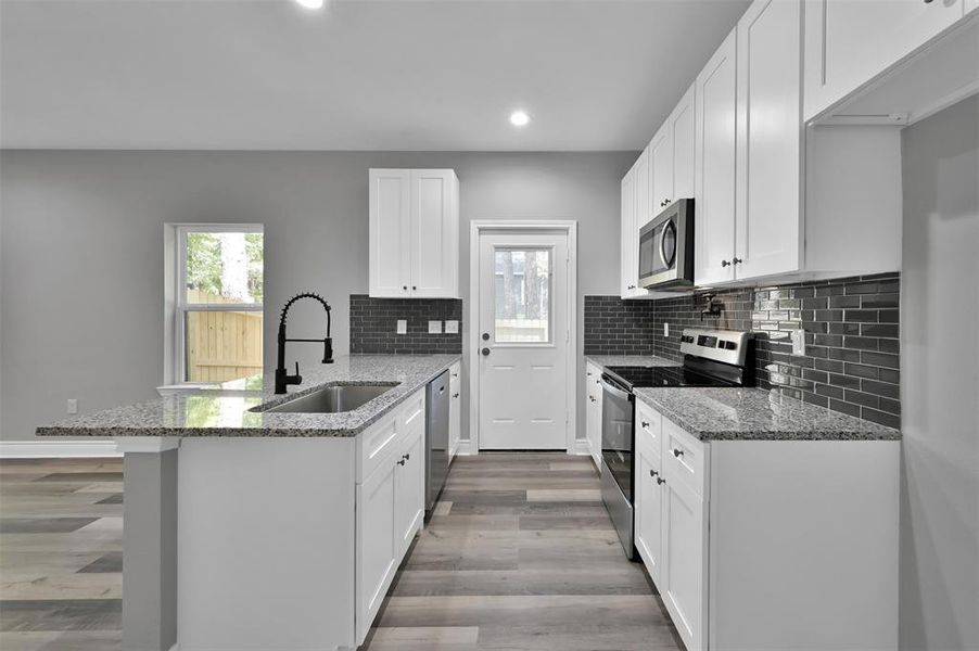 Furnished interior in a model home at Lake Conroe Village in Montgomery (Image 9). Furnished interior in a model home at Lake Conroe Village in Montgomery (Image 9).