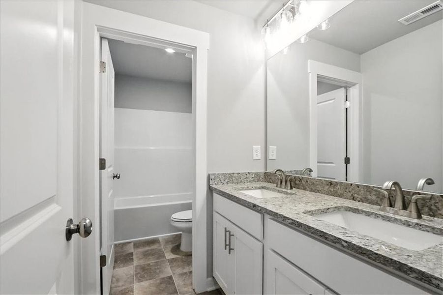 Furnished interior view inside a new home in Traditions of Braselton, Jefferson (Image 9).