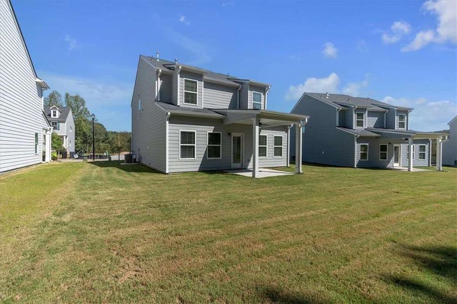 Exterior details and patio area of a home in The View at Groover's Lake, Lithia Springs (Image 3).