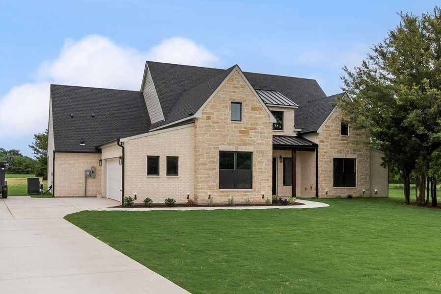 Front exterior of a new home in , Corsicana, TX, highlighting curb appeal (Image 2). Front exterior of a new home in , Corsicana, TX, highlighting curb appeal (Image 2).