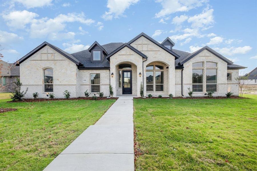 Front exterior of a new home in Ten Mile Creek Estates, DeSoto, TX, highlighting curb appeal (Image 22).