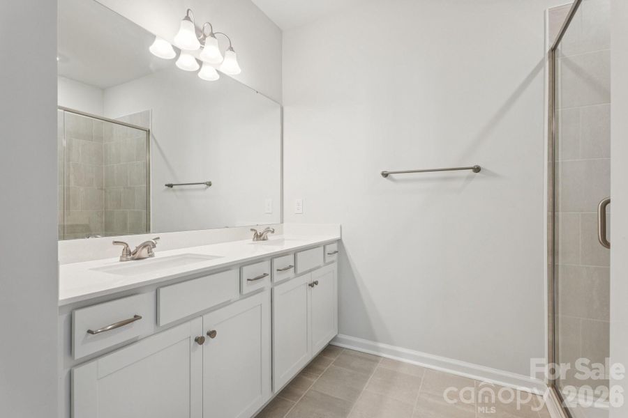 Primary Bath with Dual Quartz Vanity