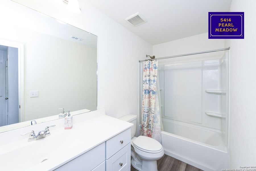 Furnished interior view inside a new home in Liberte, Converse (Image 14).