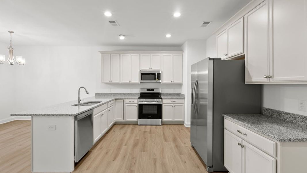 Representative furnished interior of a home built from the Interior Unit by D.R. Horton in Pearson Road Townhomes, Easley (Image 7).