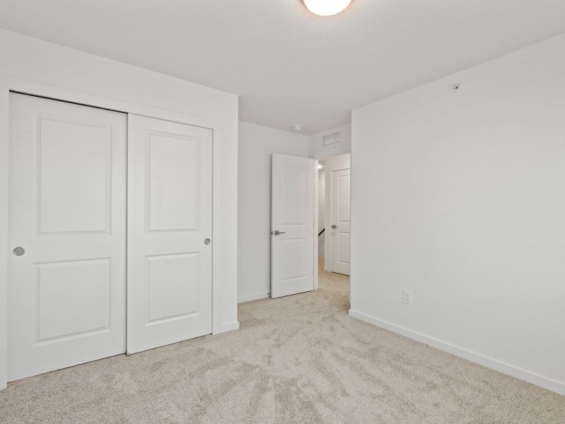 Representative unfurnished interior of a home built from the Greyson by Lokal Homes in The Commons at Victory Ridge, Colorado Springs (Image 9).