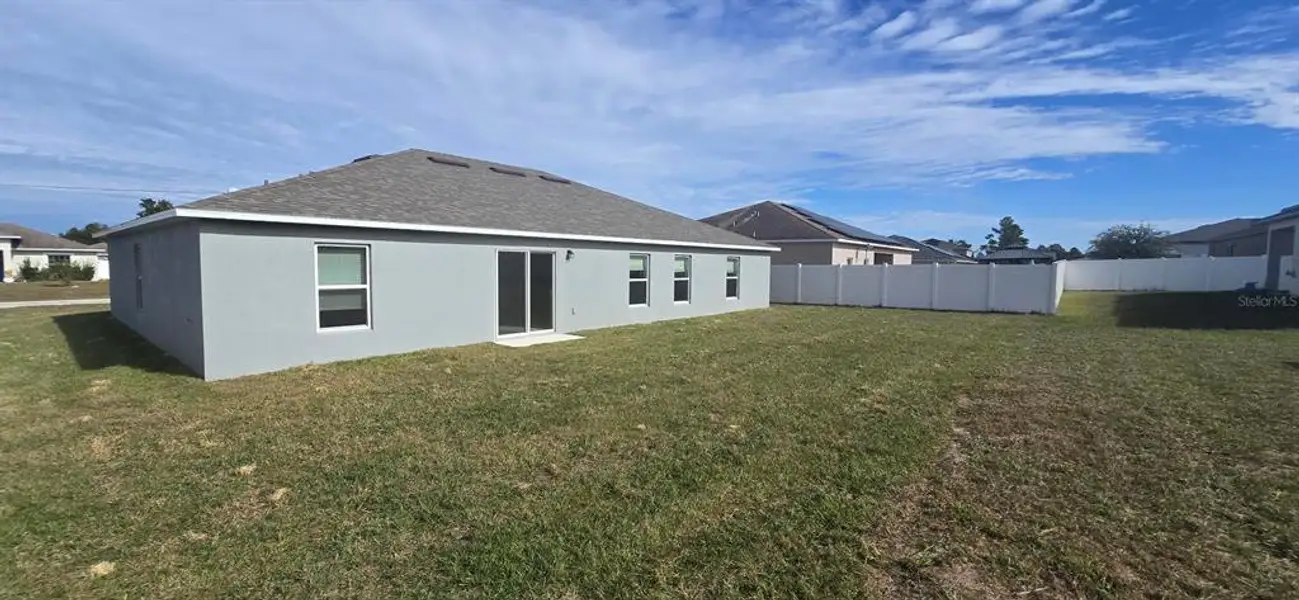 Exterior details and patio area of a home in , Poinciana (Image 3). Exterior details and patio area of a home in , Poinciana (Image 3).